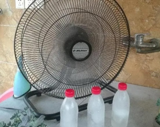 Is the wind blown by the fan hot? Just a plastic bottle is needed to blow out the cool air like an air conditioner